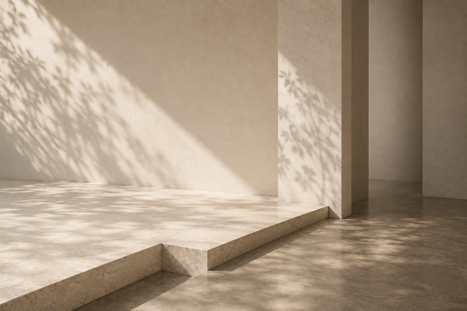 Sunlit travertine interior with dappled leaf shadows